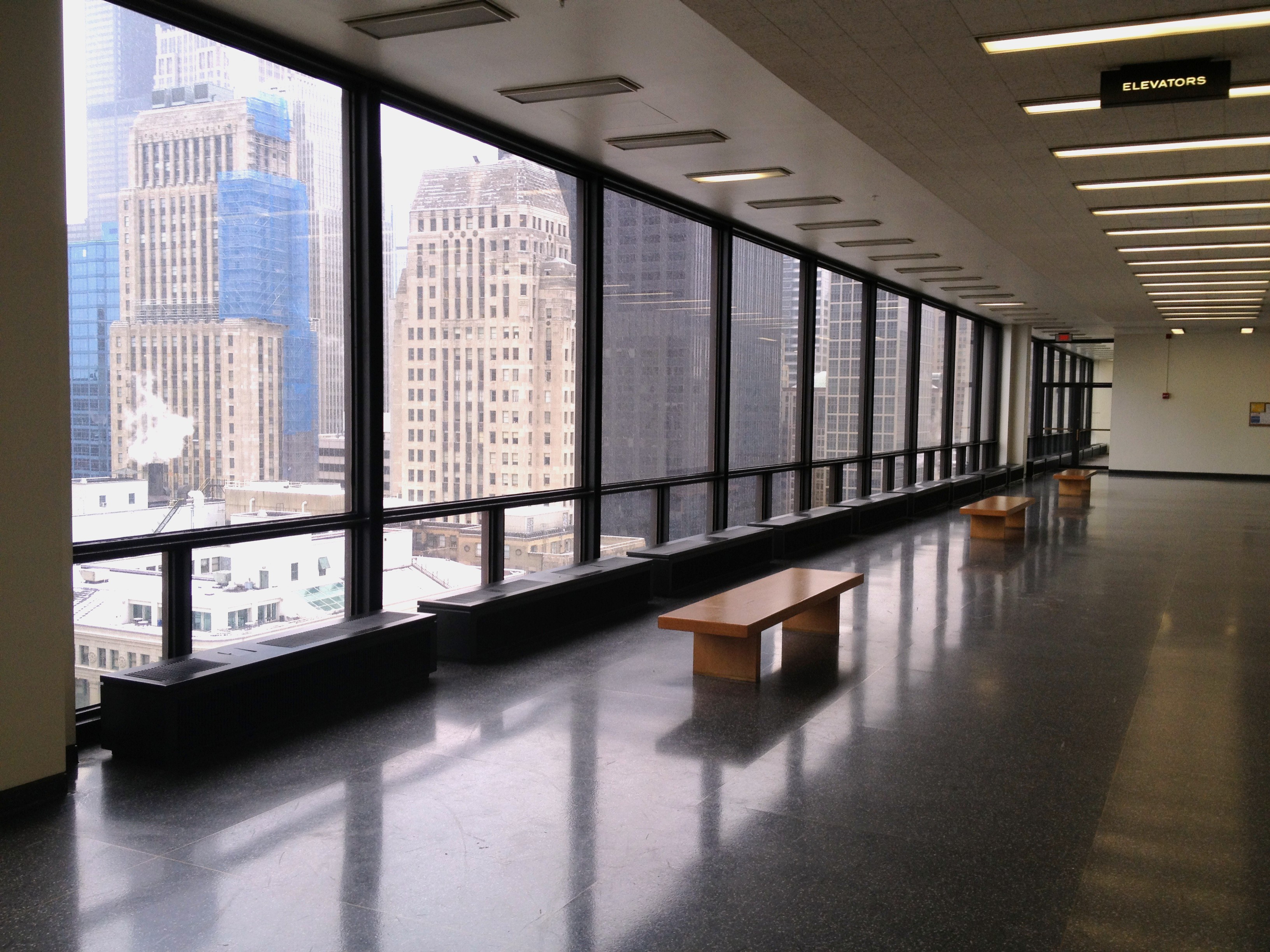A courthouse corridor overlooking the Chicago Loop